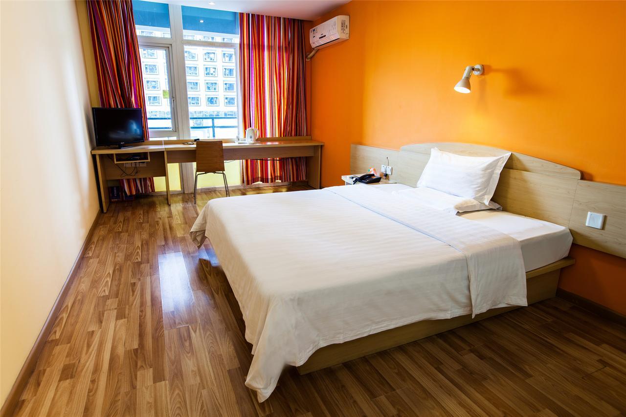 7Days Inn Qingdao Development Zone Jinshatan Номер фото